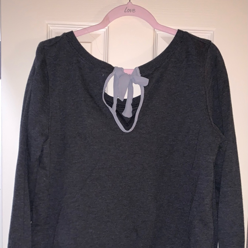 Adorable sweater with mesh bow on back